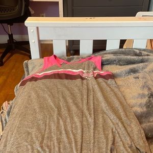 This is a tank top that is short in the front and long in the back